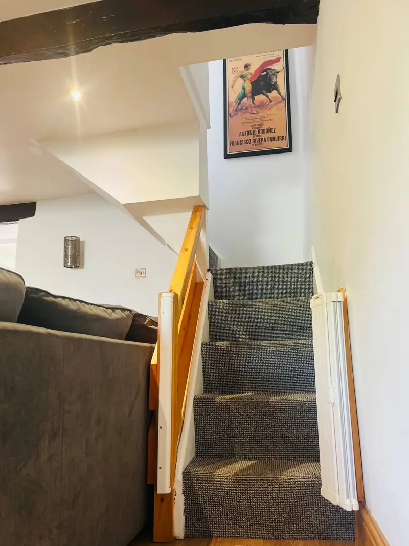 The steep staircase at Spring Cottage