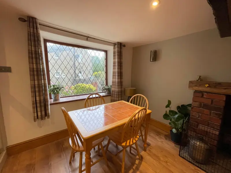 Dining table by the leaded window